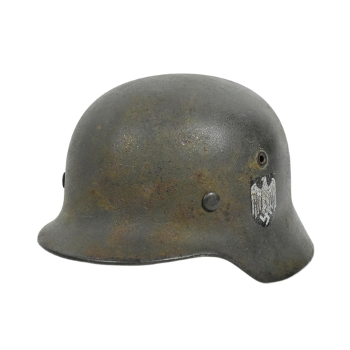 361 - An original WWII Second World War Third Reich Nazi German M40 Stahlhelm steel combat helmet. A singl... 