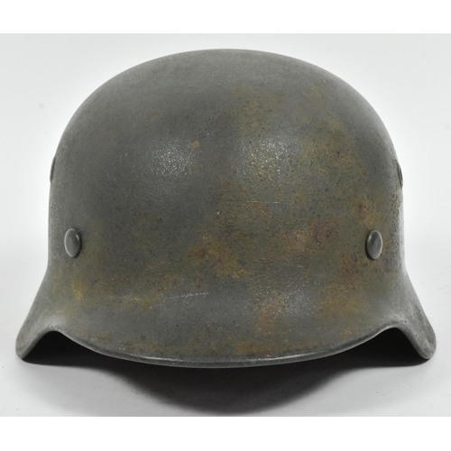 361 - An original WWII Second World War Third Reich Nazi German M40 Stahlhelm steel combat helmet. A singl... 