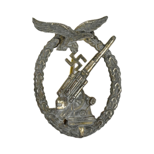 375 - A WWII Second World War Third Reich Nazi German Anti Aircraft / Army Flak badge. The badge depicting... 