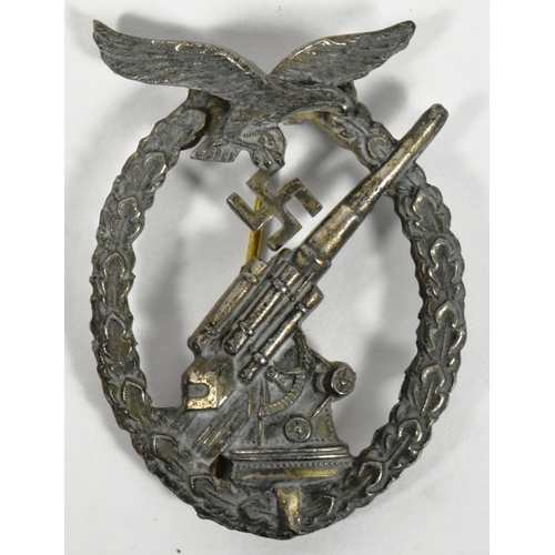 375 - A WWII Second World War Third Reich Nazi German Anti Aircraft / Army Flak badge. The badge depicting... 