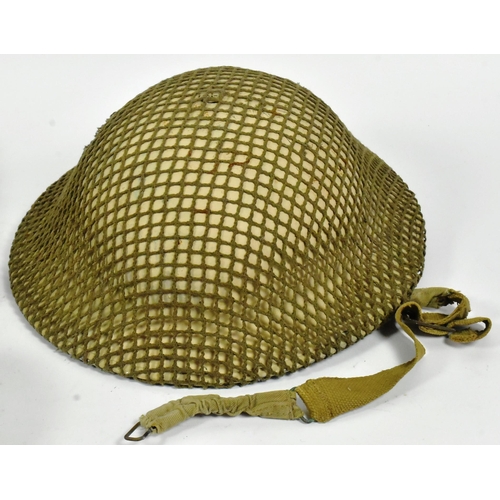 379 - A collection of assorted militaria comprising a WWII Second World War 1939 dated brodie helmet with ... 