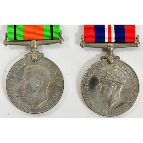 38 - A WWII Second World War medal group comprising British War medal, Defence medal, 1939-45 Star and Bu... 