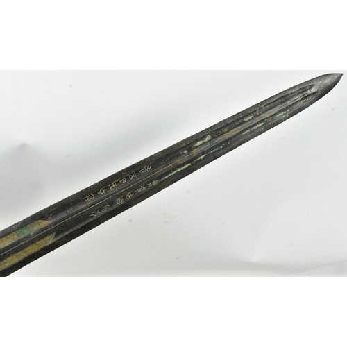 391 - A 19th Century Chinese Bronze age style sword. One piece construction with a double fullered blade e... 