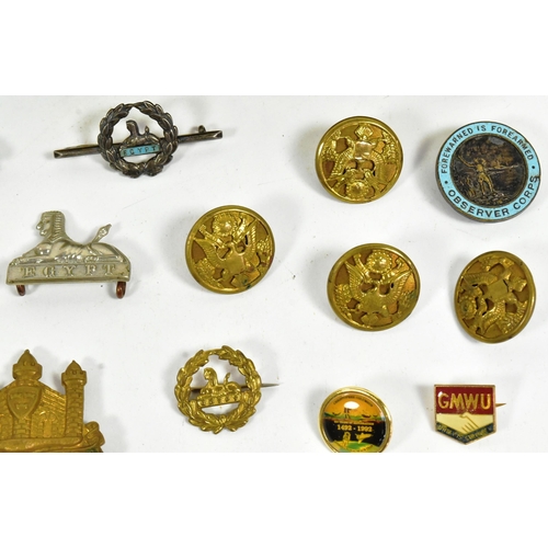 393 - A collection of WWII Second World War British Army cap badges and medals to include; 1939-45 Star, I... 