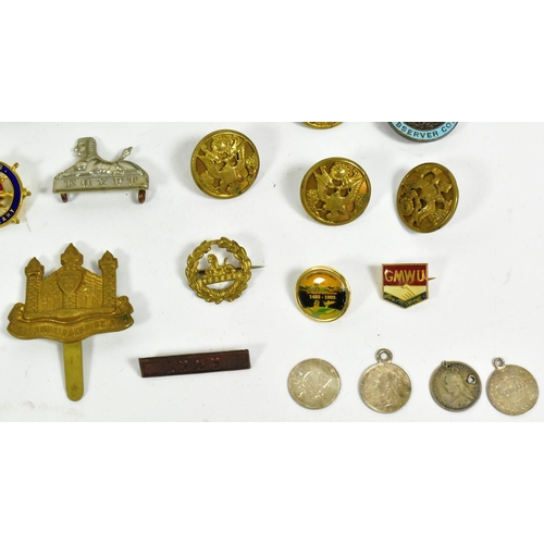 393 - A collection of WWII Second World War British Army cap badges and medals to include; 1939-45 Star, I... 