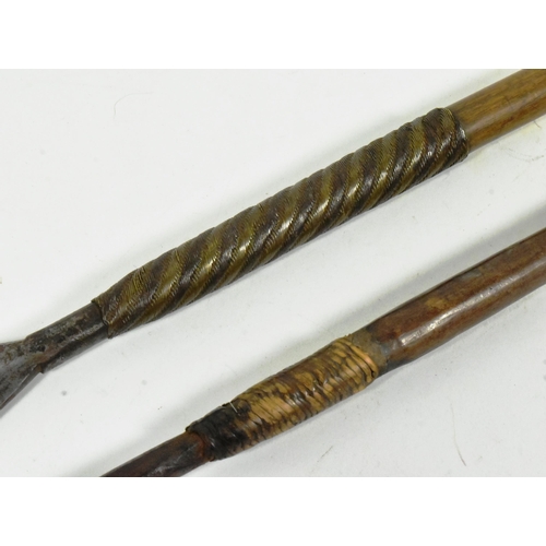 44 - Two original Southern African Zulu People Assegai / Iklwa pole weapon spears. The smaller example wi... 