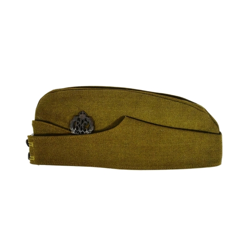 49 - A WWI First World War RFC Royal Flying Corps officers uniform side cap. The khaki cap with metal Kin... 