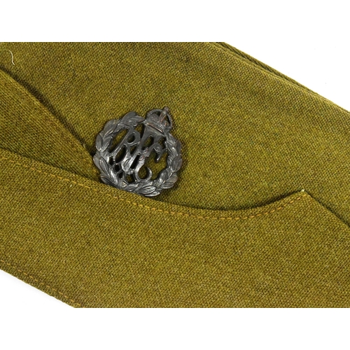 49 - A WWI First World War RFC Royal Flying Corps officers uniform side cap. The khaki cap with metal Kin... 