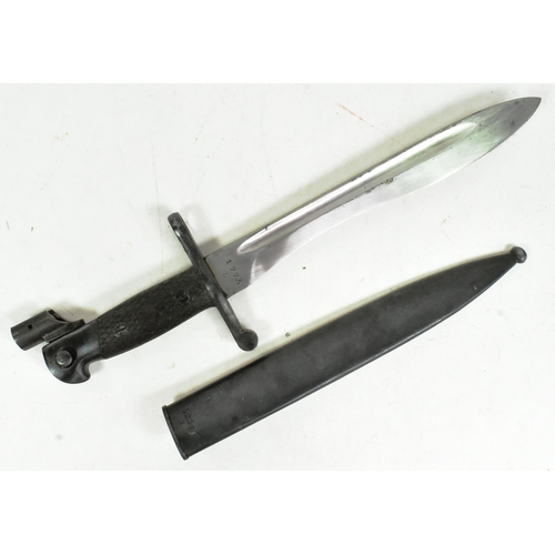 57 - A WWII Second World War Spanish M1941 Bolo rifle bayonet with Mauser attachment. Black chequered gri... 