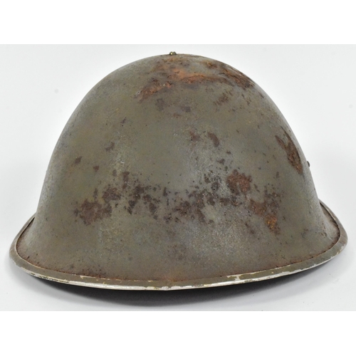 62 - A WWII Second World War British MKIII / 1944 pattern D Day helmet. Typical form with ' turtle ' shap... 