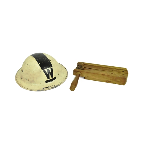 72 - A WWII Second World War British Home Front Air Raid Wardens brodie helmet with wooden gas rattle / c... 