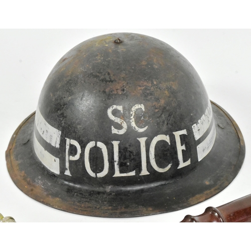 79 - A WWII Second World War British Home Front Special Constables brodie helmet, truncheon and whistle. ... 