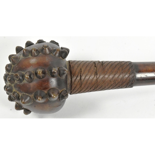 8 - A 19th Century South African Zulu Knobkerrie mace. Hardwood throwing stick with crossed metal studs ... 