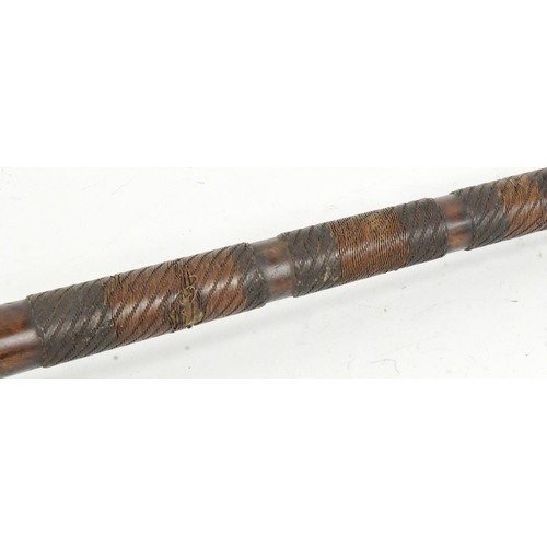 8 - A 19th Century South African Zulu Knobkerrie mace. Hardwood throwing stick with crossed metal studs ... 