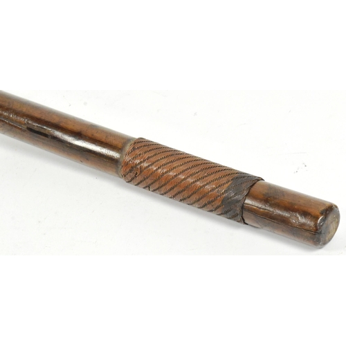 8 - A 19th Century South African Zulu Knobkerrie mace. Hardwood throwing stick with crossed metal studs ... 