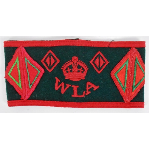 82 - Two WWII Second World War WLA Women's Land Army uniform armbands. Green with red felt patches and bu... 