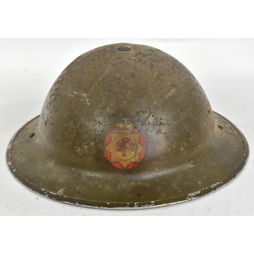 83 - A WWII Second World War NFS National Fire Service MKII helmet. The steel brodie helmet with NFS embl... 