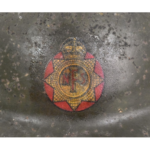 83 - A WWII Second World War NFS National Fire Service MKII helmet. The steel brodie helmet with NFS embl... 