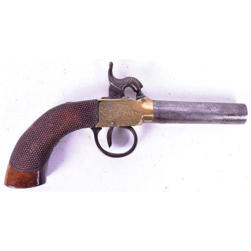 90 - An 18th Century Percussion cap pocket pistol. Turn-off barrel, foliate engraved lock plate, trigger ... 