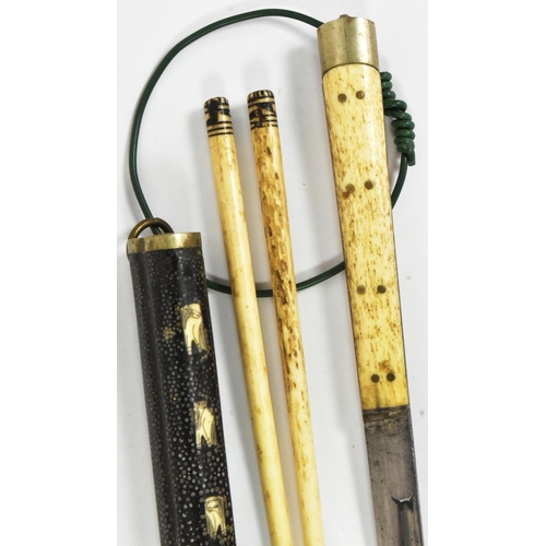 99 - A late 19th Century Chinese travelling knife and chopsticks set (Trousse). Bone construction housed ... 