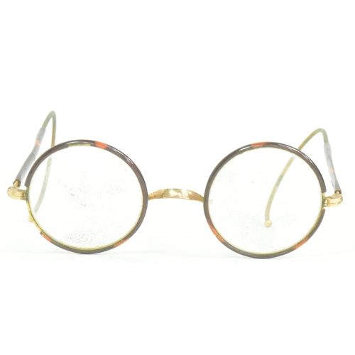 400 - Mahatma Gandhi (1869-1948) - a pair of mid-20th century c1940s gold plated and faux tortoise shell W... 