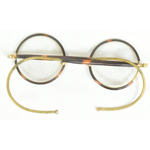 400 - Mahatma Gandhi (1869-1948) - a pair of mid-20th century c1940s gold plated and faux tortoise shell W... 