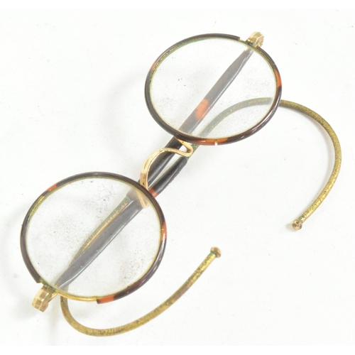 400 - Mahatma Gandhi (1869-1948) - a pair of mid-20th century c1940s gold plated and faux tortoise shell W... 