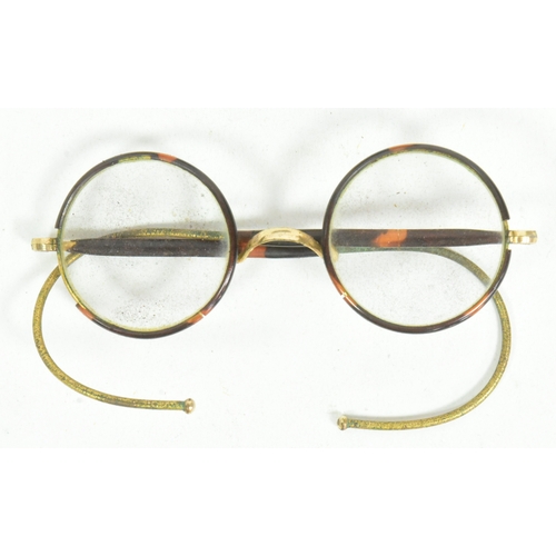 400 - Mahatma Gandhi (1869-1948) - a pair of mid-20th century c1940s gold plated and faux tortoise shell W... 