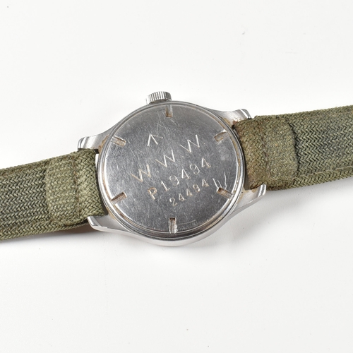 106 - A World War 2 Second World War British Army issue Cyma Dirty Dozen wristwatch. The watch having a ci... 