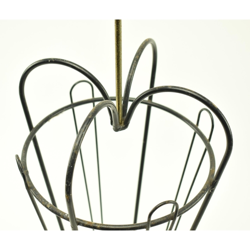 106 - A retro 20th century wire worked stick stand in the form of an umbrella. The stand having a small ba... 