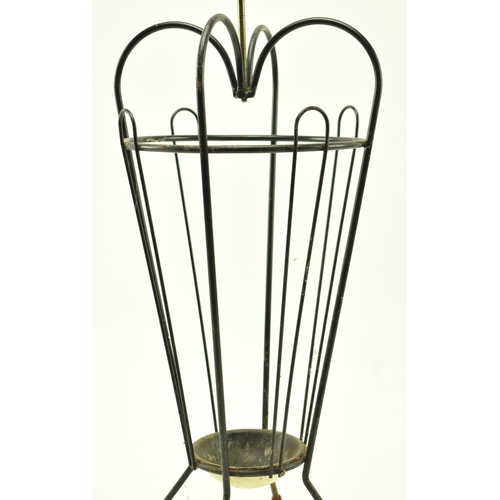 106 - A retro 20th century wire worked stick stand in the form of an umbrella. The stand having a small ba... 