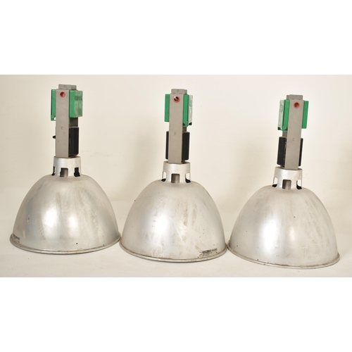 109 - Hipak - A set of six 20th century industrial hanging pendant ceiling lights. Each light having a lar... 