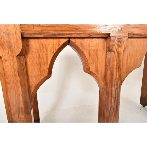 124 - A 20th century oak wood Gothic style ecclesiastic church altar table. The table having a rectangular... 