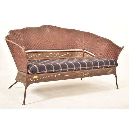 136 - A vintage late 20th century circa 1980s American designer rattan and enamelled iron two seater sofa ... 