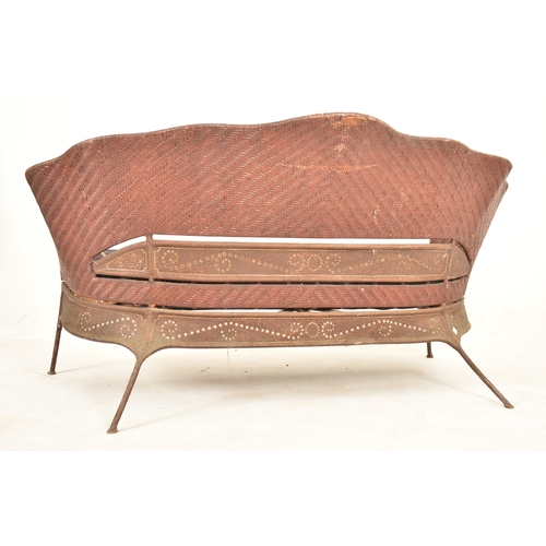 136 - A vintage late 20th century circa 1980s American designer rattan and enamelled iron two seater sofa ... 