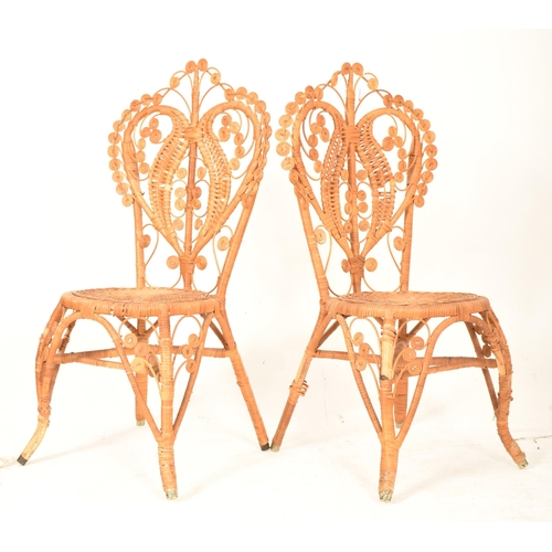 138 - Pons Leyva - A pair of retro mid 20th century Spanish bamboo and wicker woven peacock chairs. Each c... 