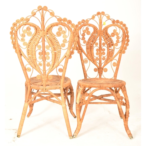 138 - Pons Leyva - A pair of retro mid 20th century Spanish bamboo and wicker woven peacock chairs. Each c... 