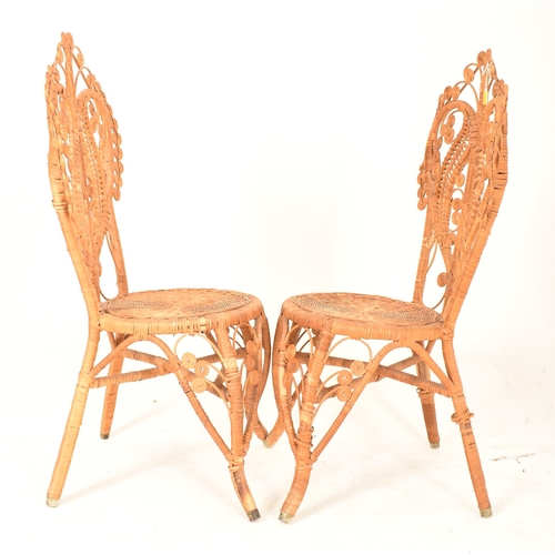 138 - Pons Leyva - A pair of retro mid 20th century Spanish bamboo and wicker woven peacock chairs. Each c... 