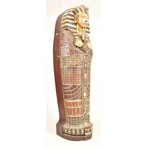 140 - A vintage 20th century Ancient Egyptian style life-size sarcophagus storage display cabinet depictin... 
