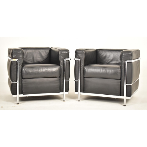 158 - After Le Corbusier - LC2 model - A pair of retro late 20th century leatherette & chrome reception of... 