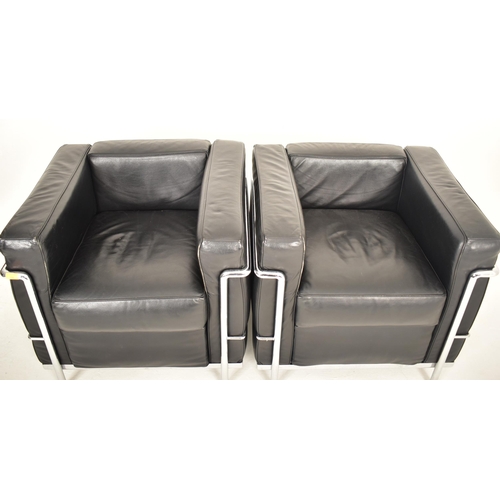 158 - After Le Corbusier - LC2 model - A pair of retro late 20th century leatherette & chrome reception of... 