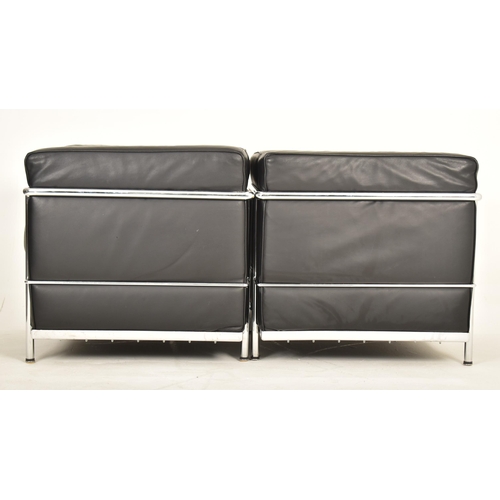 158 - After Le Corbusier - LC2 model - A pair of retro late 20th century leatherette & chrome reception of... 
