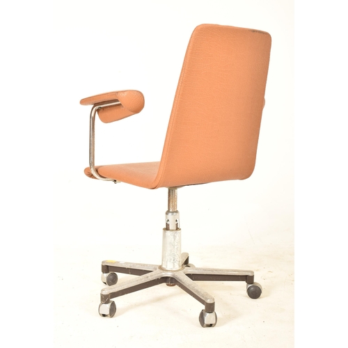 178 - A retro 20th century designer swivel office desk chair in the manner of Finn Juhl. The chair having ... 