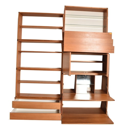 210 - Beaver & Tapley - A large selection retro 20th century teak modular wall hanging storage system. The... 
