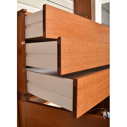 210 - Beaver & Tapley - A large selection retro 20th century teak modular wall hanging storage system. The... 
