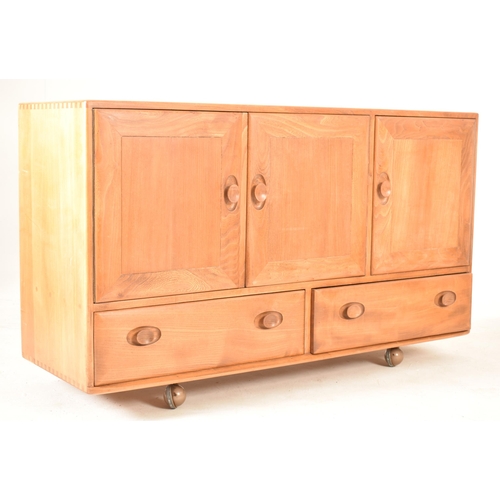 215 - Lucian Ercolani for Ercol - Model 366 - A retro 1960s beech and elm sideboard credenza in blonde. Th... 