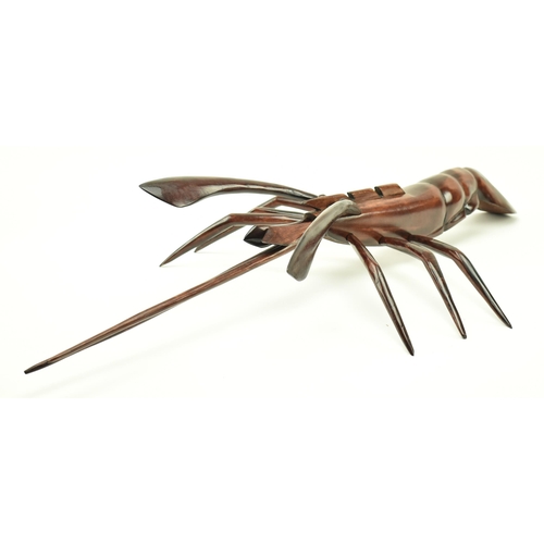 218 - A continental believed French vintage bespoke made carved hardwood sculpture of lobster. The lobster... 