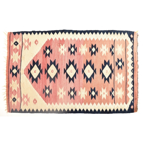 220 - A vintage 1980s South West Turkey imported by Rufus Reade for Out of The Nomads Tent kilim. The kili... 