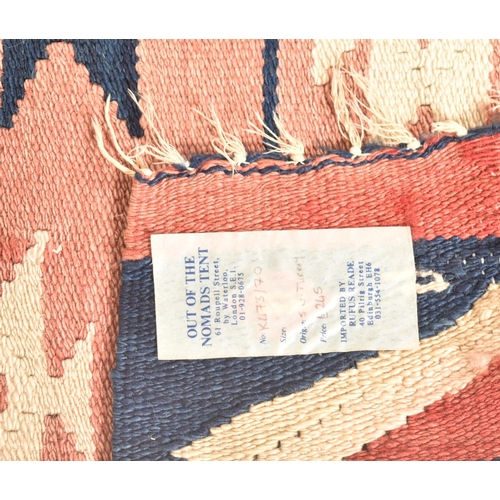 220 - A vintage 1980s South West Turkey imported by Rufus Reade for Out of The Nomads Tent kilim. The kili... 