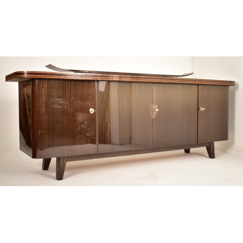 222 - A retro mid 20th century German designer sideboard credenza. The sideboard having a formica finished... 